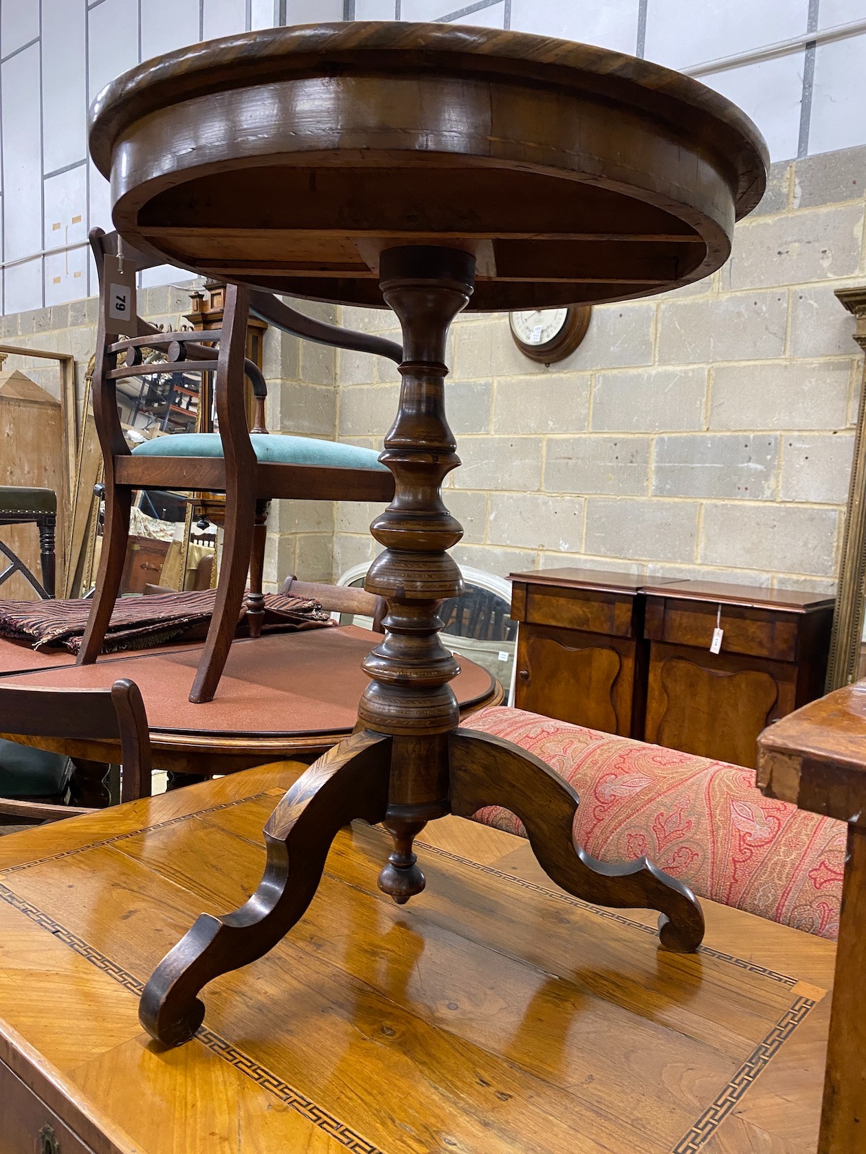 An early 20th century French circular parquetry inlaid tripod table, diameter 51cm, height 71cm.